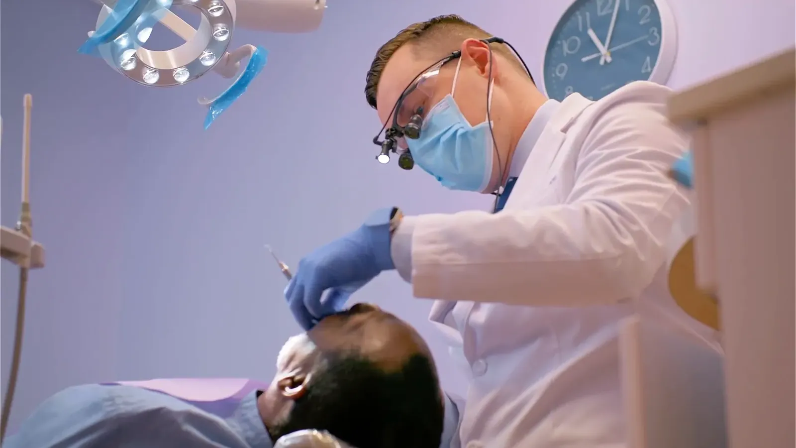 Dr. Godko wearing surgical loupes